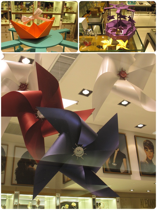 vitrine-dia-das-criancas-para alexandre-de-paris-cataventos-em-origami